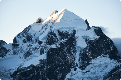 Snowy mountain peak in Nepal with clear blue sky